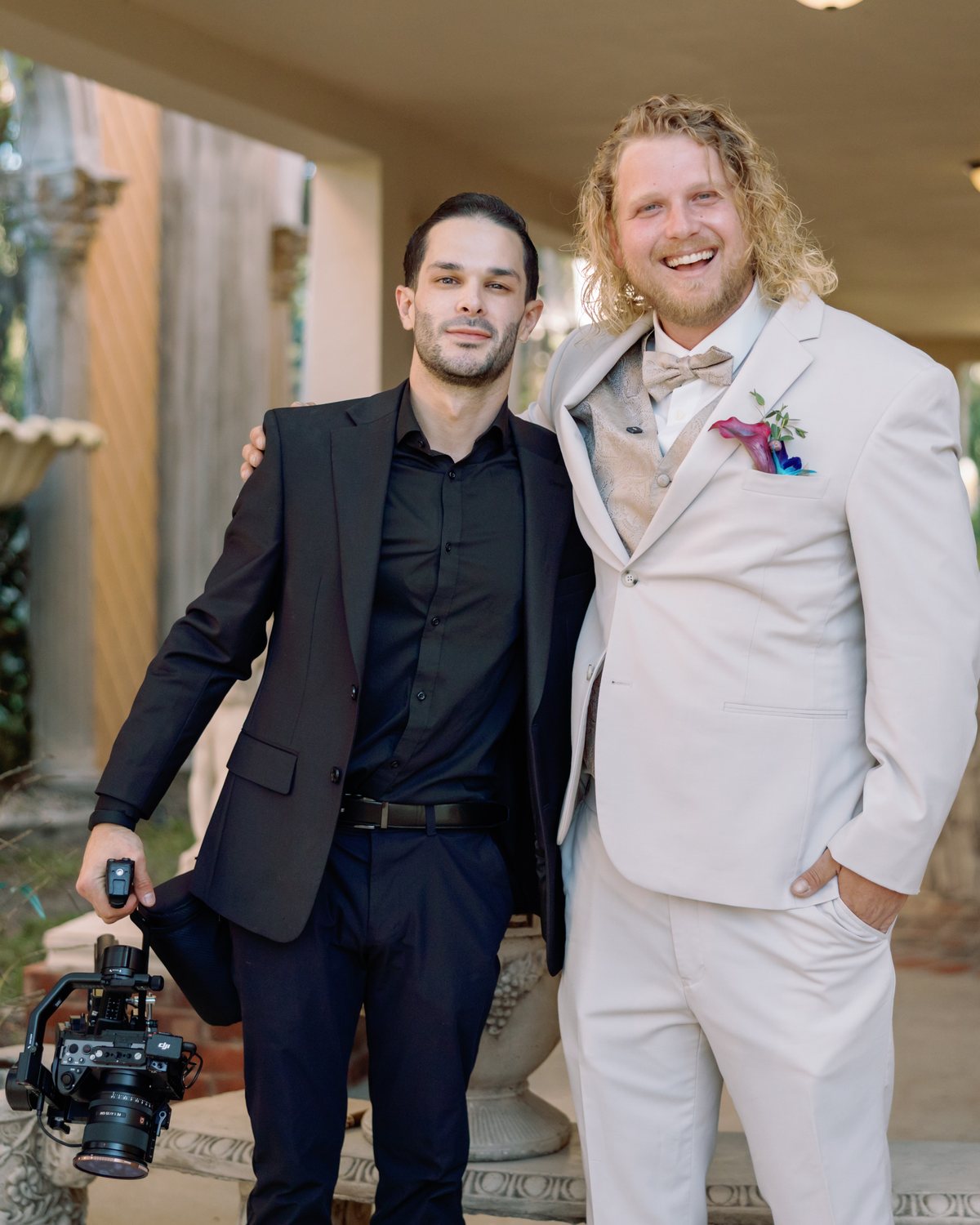 Ricardo Gamboa with a groom he filmed, camera gimbal in hand, Vantage Studio